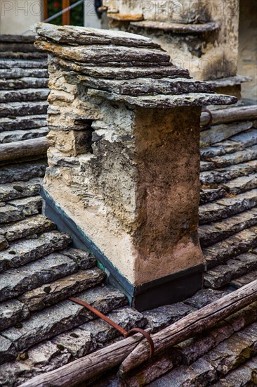 Characteristic old buildings in stone and wood in the village of Fusio