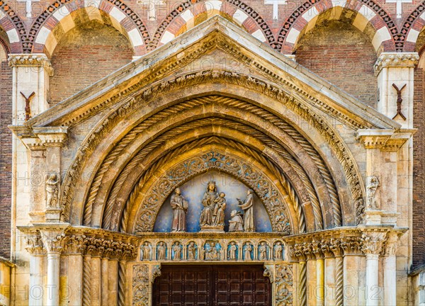 Magnificent lunette of the portal in front of which Peter the Dwarf kneels