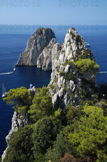 Rocky coast with boats on the sea