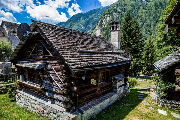 Characteristic old buildings in stone and wood in the hamlet of Mogno