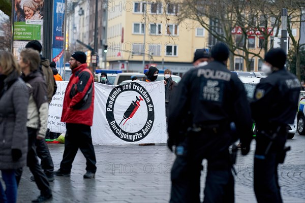 Antifa counter-demonstrators on the fringes of a demonstration by cross-thinkers against the Corona measures Koblenz
