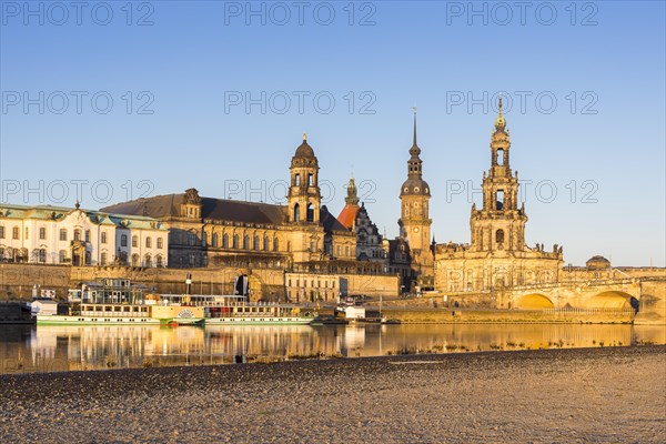 City view in the morning light with reflection in the river Elbe