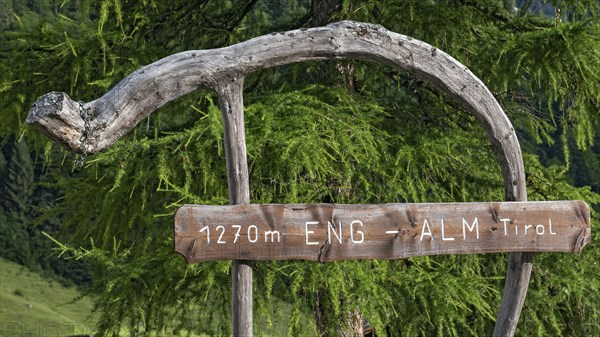 Wooden sign in the Eng-Alm with altitude indication