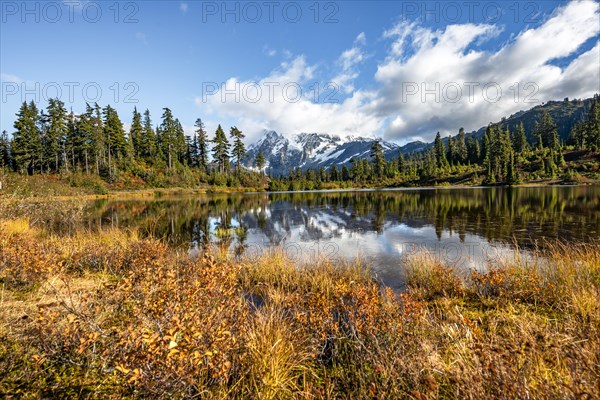 Mt. Shuksan glacier with snow reflecting in Picture Lake