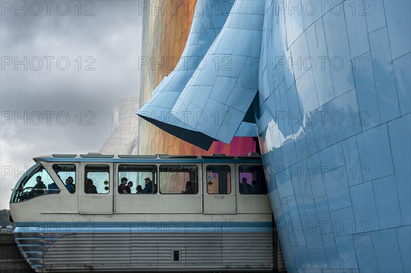 Monorail train runs through museum