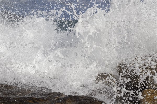 Strong swells during storm break on seawall in Sanremo