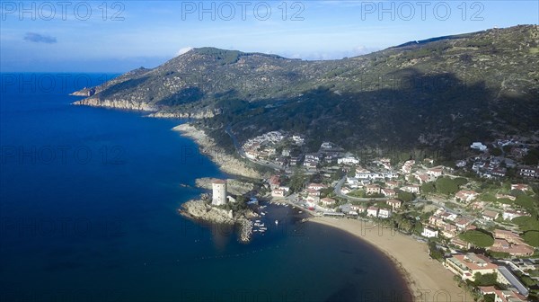 Bird's eye view of the coast of Giglio Campese with the Saracen defence tower Torre del Campese from 1600