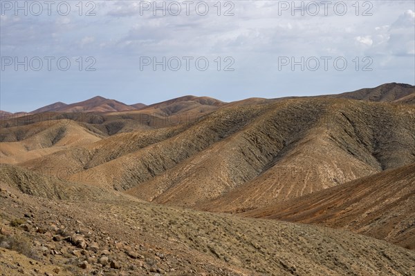 View from the Mirador Astronomico de Sicasumbre to the north of the bare mountains around Pajara