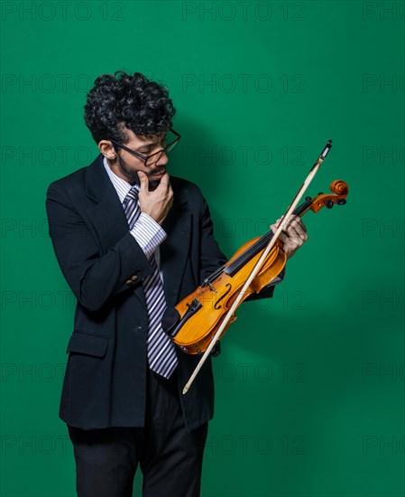 Happy violinist with his violin