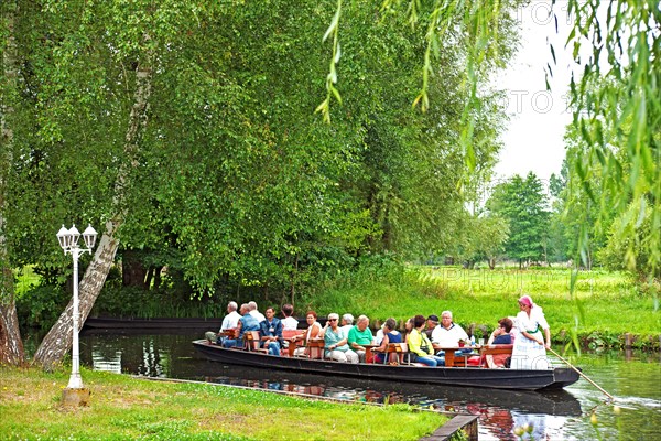 Tourists in a typical barge in the Spreewald