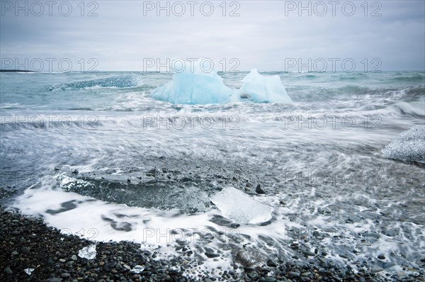 Chunks of ice on the black lava beach Diamond beach