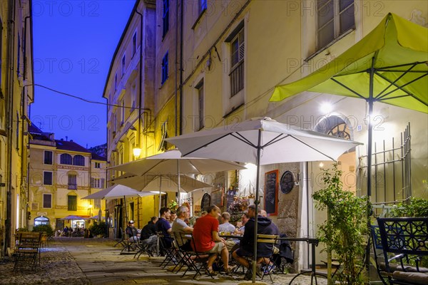 Twilight in the alleys with restaurants