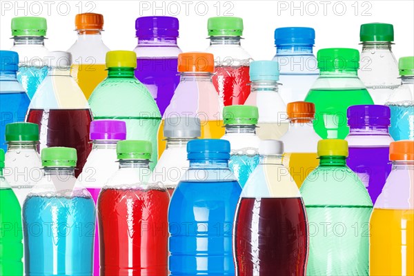 Bottles with colourful drinks