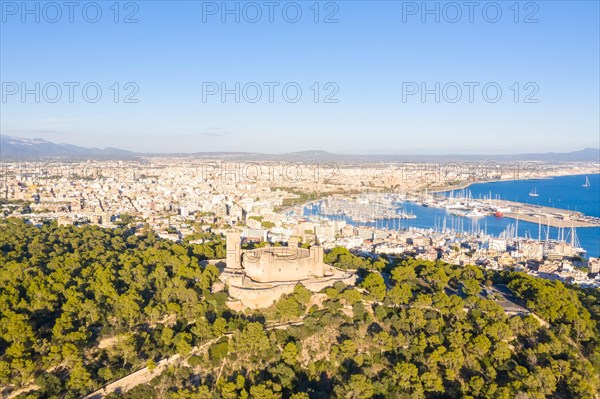 Castell de Bellver castle with harbour holiday travel aerial view in Palma de Majorca