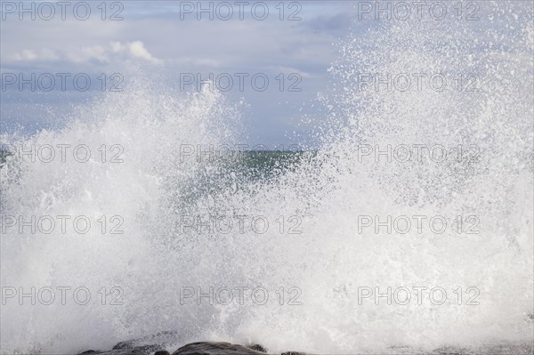 Strong swells during storm break on seawall in Sanremo