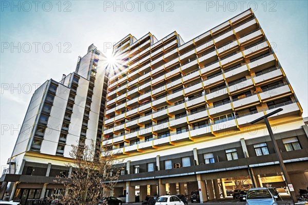 High-rise building with concrete balconies