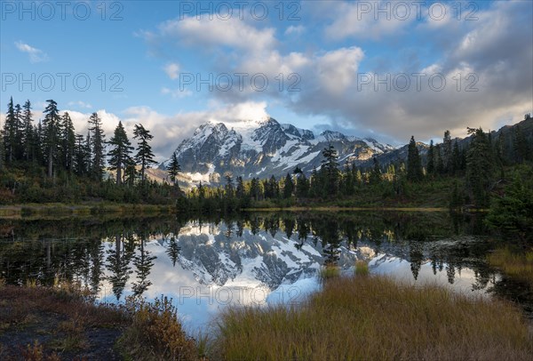 Mt. Shuksan glacier with snow reflecting in Picture Lake