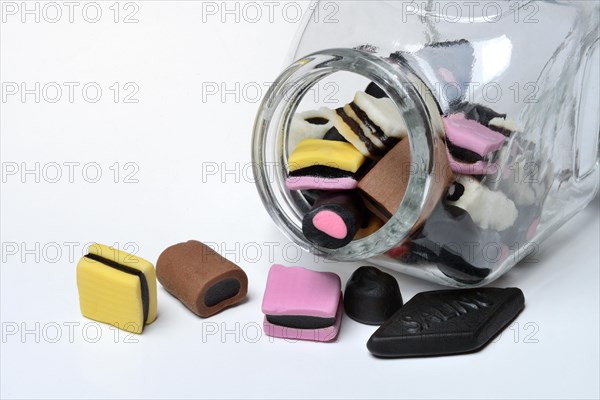 Liquorice sweets in glass container