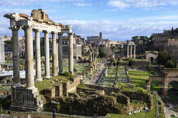 View of ruins with columns and remains of foundations of Temple of Saturn