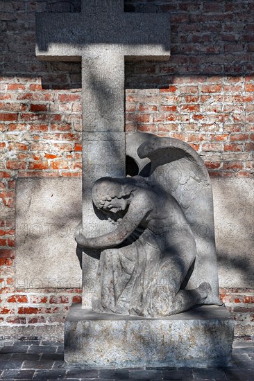 Mourning angel on the wall at Suedfriedhof with tomb of Prof. Dr. phil. Joseph Buchner