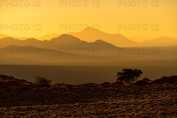 Streak of sunrise light in Namib Rand Nature Reserve