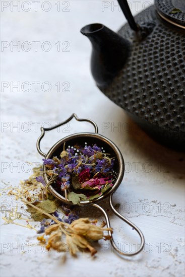 Tea blend in tea strainer