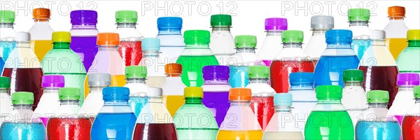 Bottles with colourful drinks