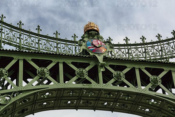 Ornate bridge gate with coat of arms and St. Stephen's crown