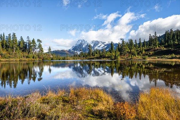 Mt. Shuksan glacier with snow reflecting in Picture Lake