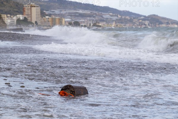 Strong swells during storm break on seawall in Sanremo