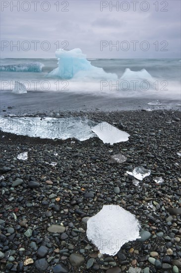 Chunks of ice on the black lava beach Diamond beach