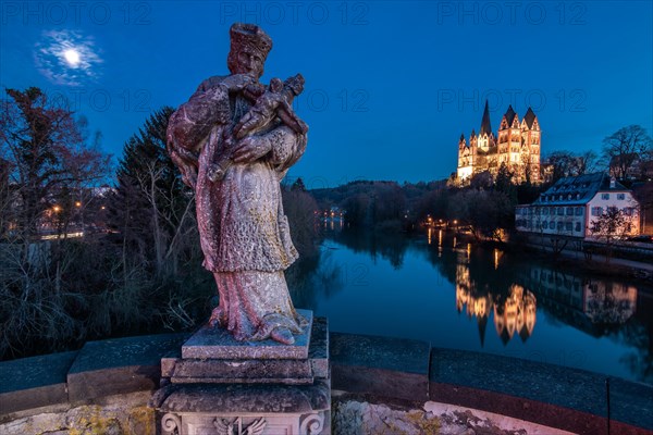 Limburg Cathedral from the Old Bridge with statue of St. John of Nepomuk at dusk