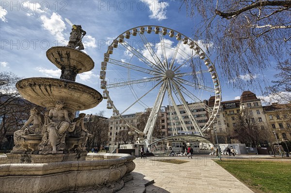 Danubius Fountain and Budapest Eye Ferris Wheel