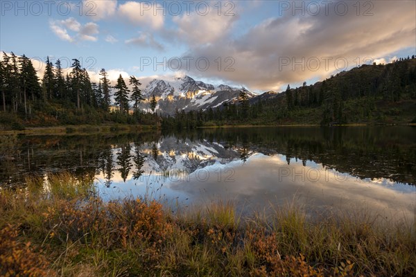 Mt. Shuksan glacier with snow reflecting in Picture Lake