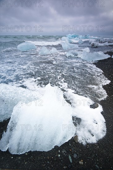 Chunks of ice on the black lava beach Diamond beach