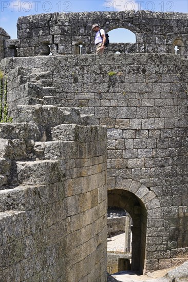 Tourist Walking On The Castle Ramparts Photo12 imageBROKER G M Therin 