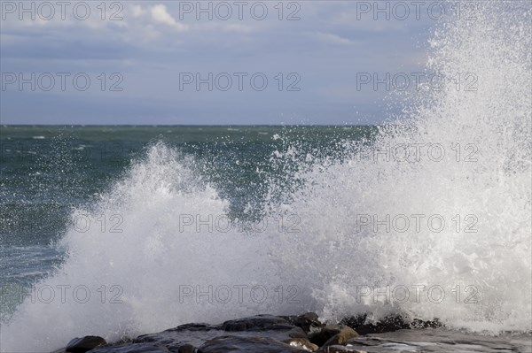 Strong swells during storm break on seawall in Sanremo