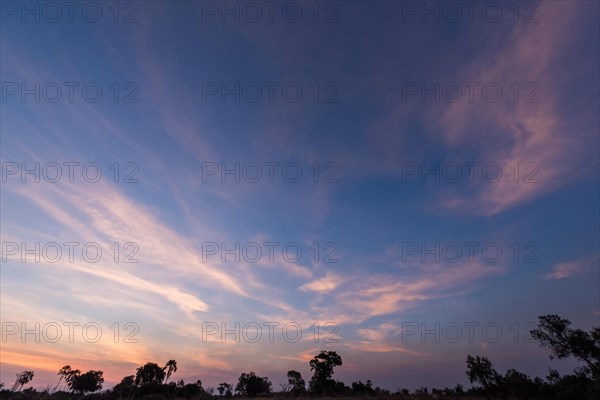 Coloured veil clouds over the Okavango Delta