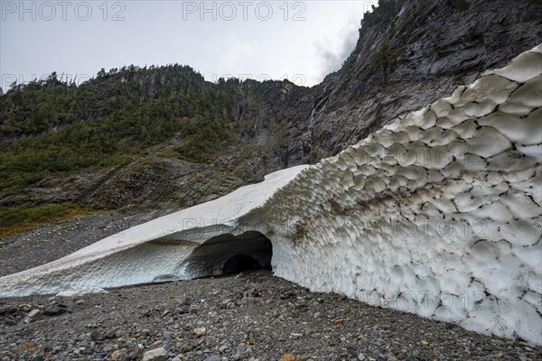 Entrance of an ice cave of a glacier