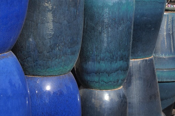 Turquoise and blue stone tubs in nursery