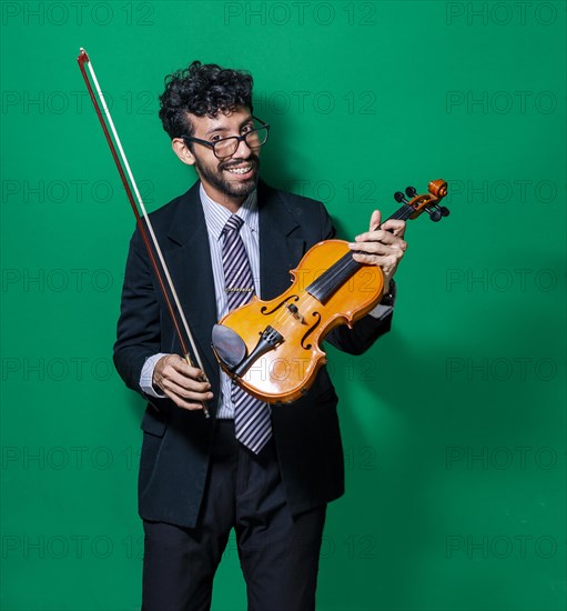 Happy violinist with his violin