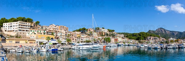 Port with boats holiday travel town panorama in Majorca in Port de Soller