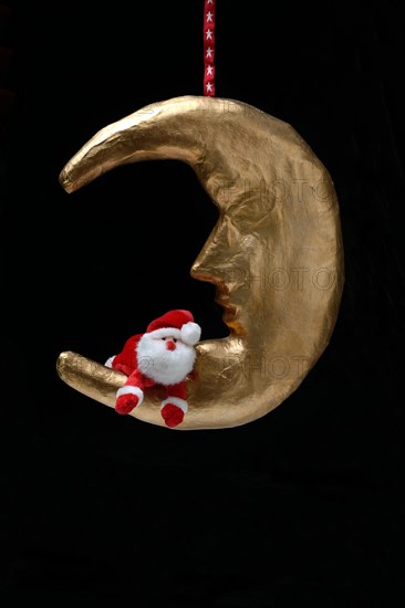 Golden Cardboard Moon with Father Christmas Figure