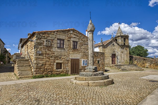 Stone pillory and Main Church