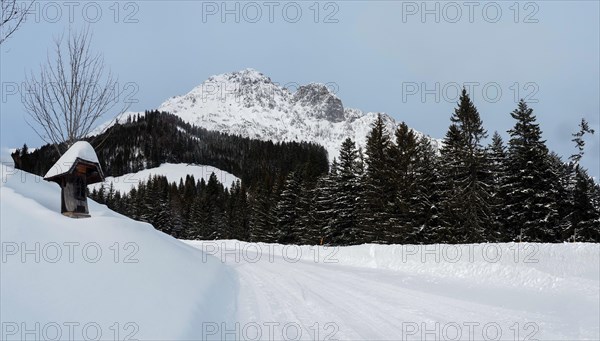 View of the snow-covered Bosruck mountain range