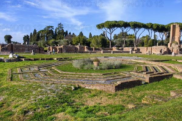 Remains of historic octagonal fountain Ornamental fountain in former Pery style portico