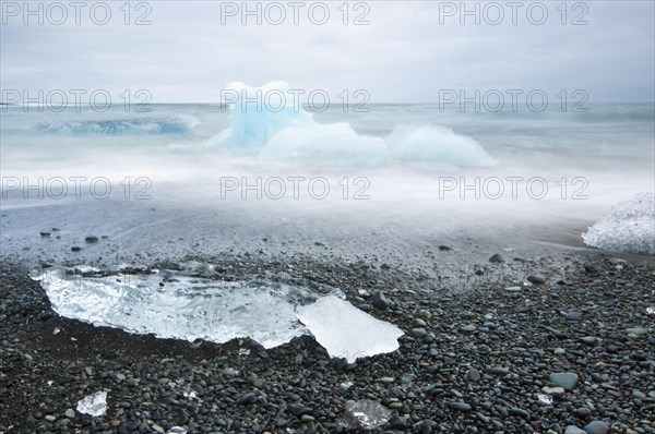 Chunks of ice on the black lava beach Diamond beach