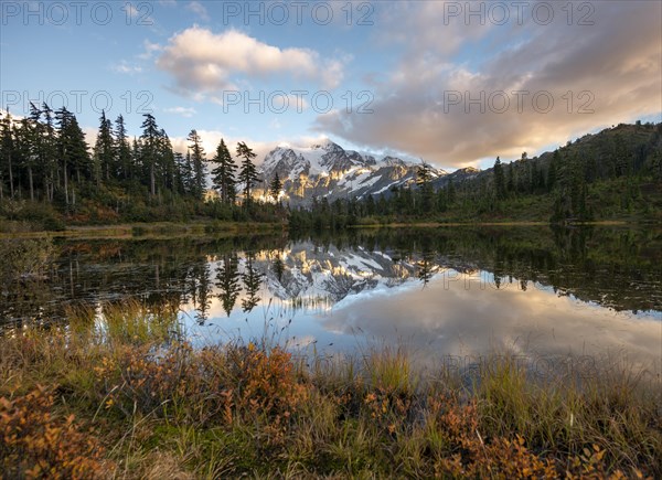 Mt. Shuksan glacier with snow reflecting in Picture Lake