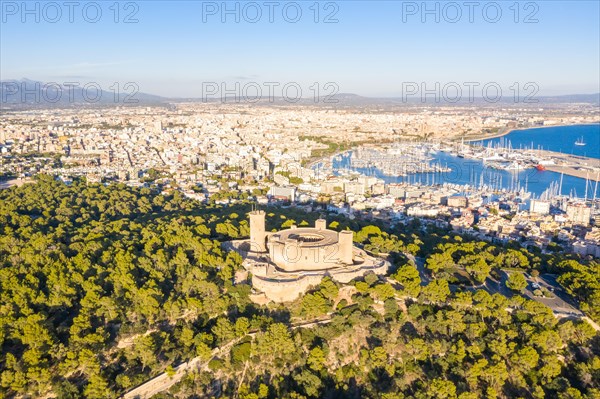 Castell de Bellver castle with harbour holiday travel aerial view in Palma de Majorca
