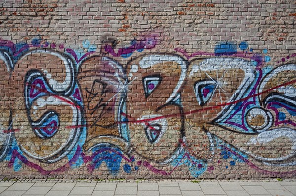 Wall at the southern cemetery with graffiti